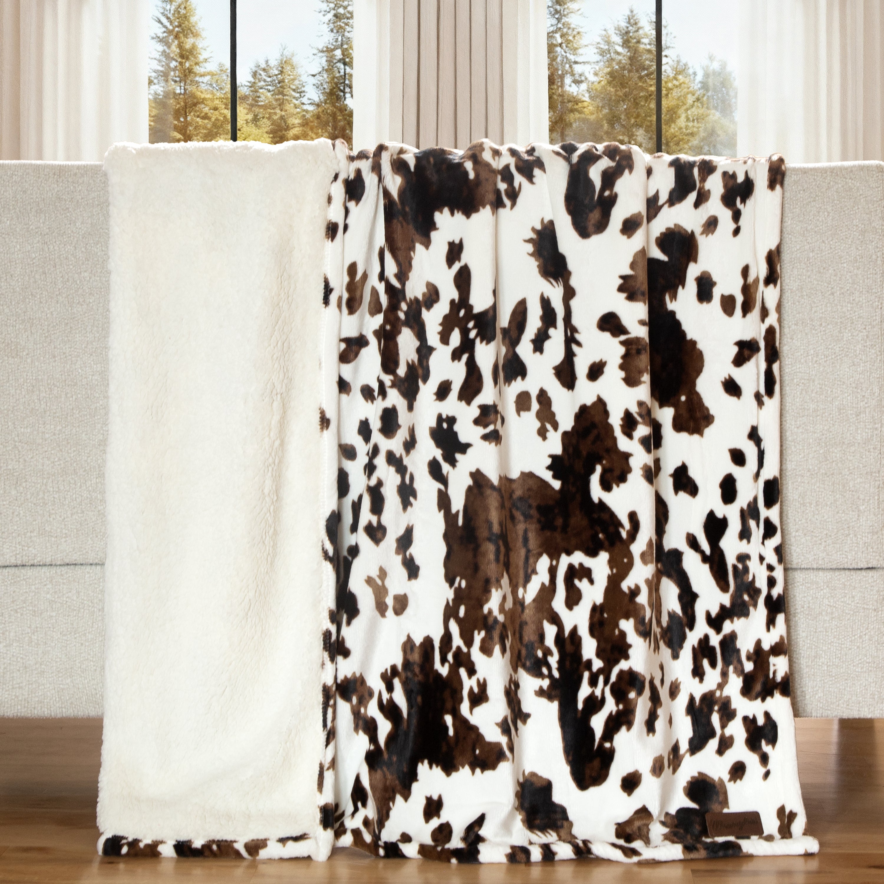 Wrangler® Tri-color Cowhide Plush Sherpa Throw – Carstens, Inc