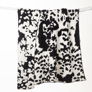 Wrangler Black & White Cowhide Stretchy Throw Blanket