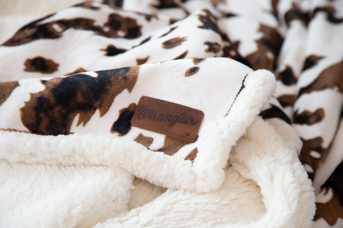 Wrangler® Tri-color Cowhide Plush Sherpa Throw